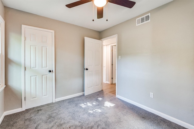 6632 Avalon Dr, Watauga, TX 76148 - unfurnished bedroom featuring carpet, baseboards, and a ceiling fan