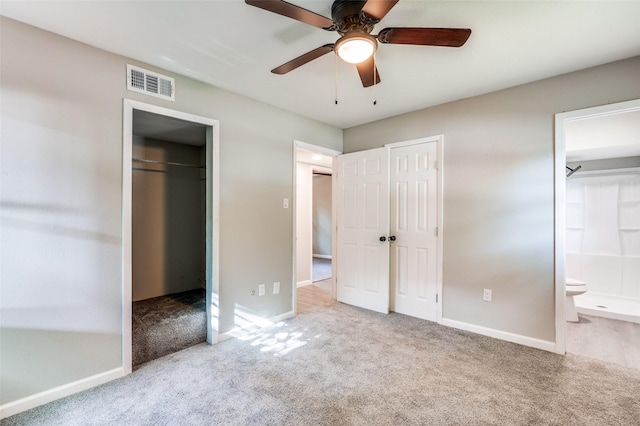 6632 Avalon Dr, Watauga, TX 76148 - unfurnished bedroom featuring carpet floors, ensuite bath, baseboards, and multiple closets