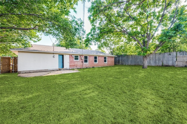 6632 Avalon Dr, Watauga, TX 76148 - rear view of house featuring a patio area and brick siding