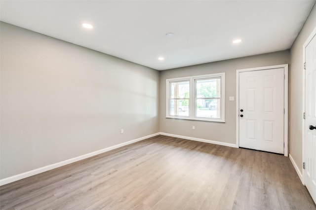 6632 Avalon Dr, Watauga, TX 76148 - entrance foyer with light wood finished floors, baseboards, and recessed lighting