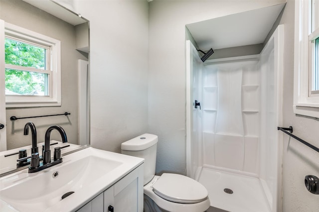 6632 Avalon Dr, Watauga, TX 76148 - bathroom featuring vanity, a shower, toilet, and a textured wall