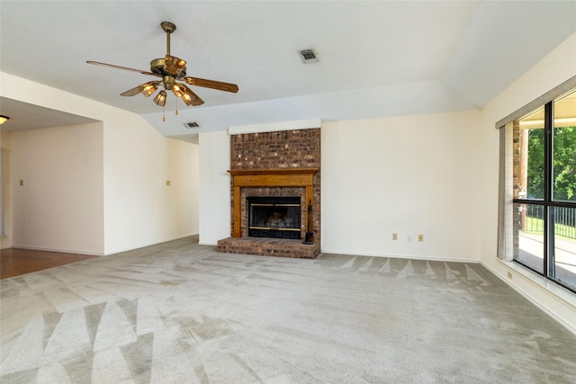 4007 Cherokee Ct, Granbury, TX 76048 - unfurnished living room featuring carpet flooring, ceiling fan, lofted ceiling, a fireplace, and baseboards