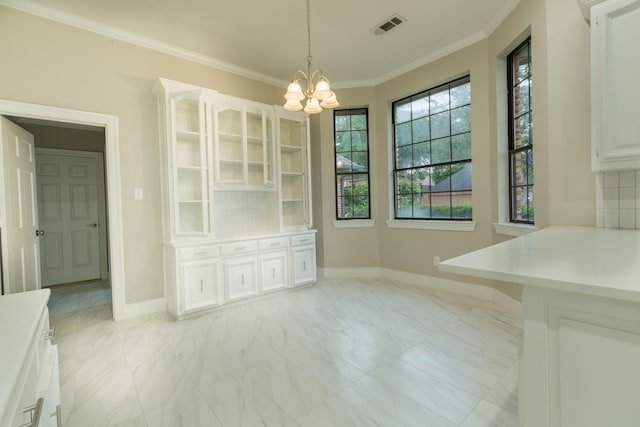 2302 Tiffany Ct, Garland, TX 75043 - unfurnished dining area with a chandelier, light marble finish flooring, ornamental molding, and baseboards