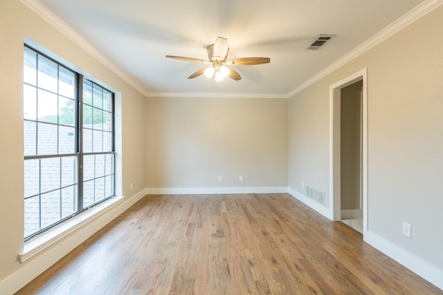 2302 Tiffany Ct, Garland, TX 75043 - unfurnished room with ceiling fan, ornamental molding, wood finished floors, and baseboards