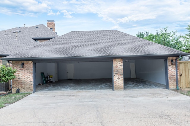 2302 Tiffany Ct, Garland, TX 75043 - garage with concrete driveway and central air condition unit