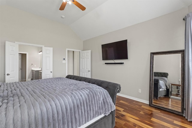 7008 Clipper Dr, Grand Prairie, TX 75054 - bedroom featuring baseboards, dark wood-style floors, ceiling fan, ensuite bath, and high vaulted ceiling