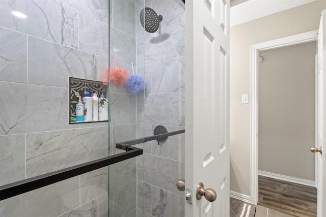 7008 Clipper Dr, Grand Prairie, TX 75054 - full bath with a tile shower and baseboards