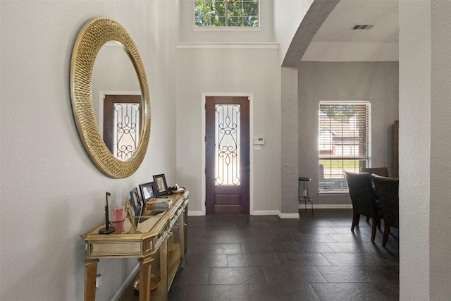 7008 Clipper Dr, Grand Prairie, TX 75054 - entryway with baseboards and stone tile floors