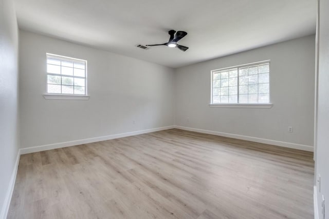 928 Westbrook Dr, Plano, TX 75075 - spare room featuring wood finished floors, baseboards, and a ceiling fan