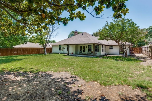 928 Westbrook Dr, Plano, TX 75075 - back of house with a chimney, a patio area, and french doors