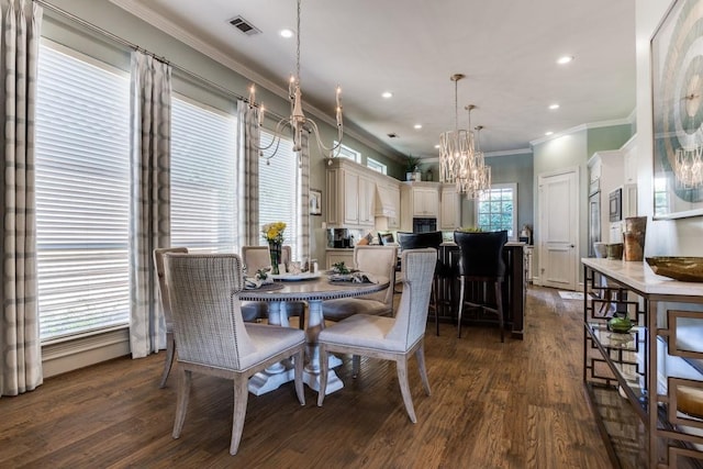 2709 Redding Dr, Plano, TX 75093 - dining area featuring ornamental molding, a chandelier, dark wood finished floors, and recessed lighting