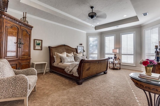 2709 Redding Dr, Plano, TX 75093 - bedroom with a tray ceiling, light colored carpet, multiple windows, ornamental molding, and baseboards