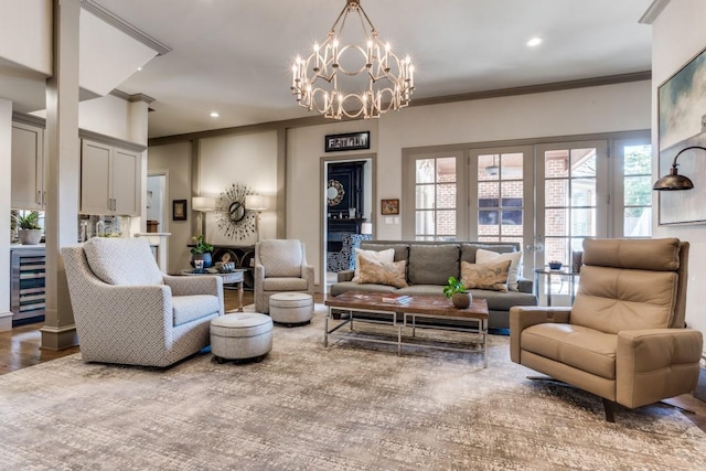 2709 Redding Dr, Plano, TX 75093 - living room featuring a chandelier, beverage cooler, plenty of natural light, recessed lighting, and wood finished floors