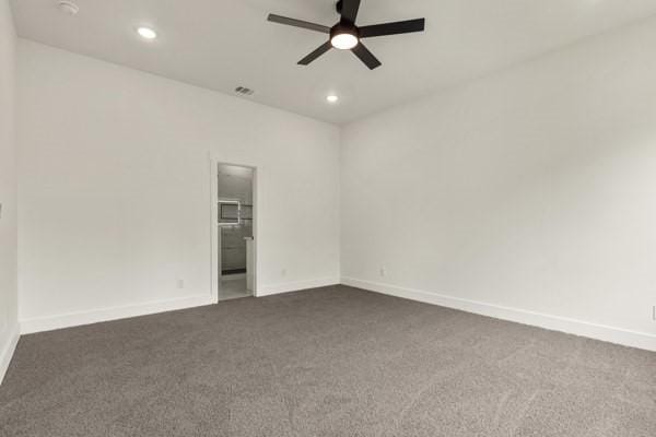 301 Bay Ct, Gun Barrel City, TX 75156 - unfurnished room featuring a ceiling fan, dark colored carpet, recessed lighting, and baseboards