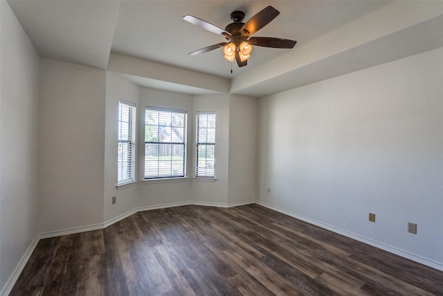 3631 Hilltop Ln, Plano, TX 75023 - unfurnished room with dark wood finished floors, a ceiling fan, and baseboards