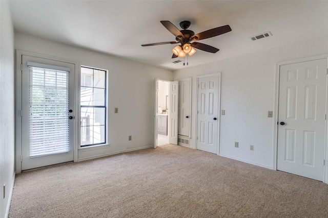 3631 Hilltop Ln, Plano, TX 75023 - unfurnished bedroom with carpet flooring, access to outside, baseboards, connected bathroom, and a ceiling fan