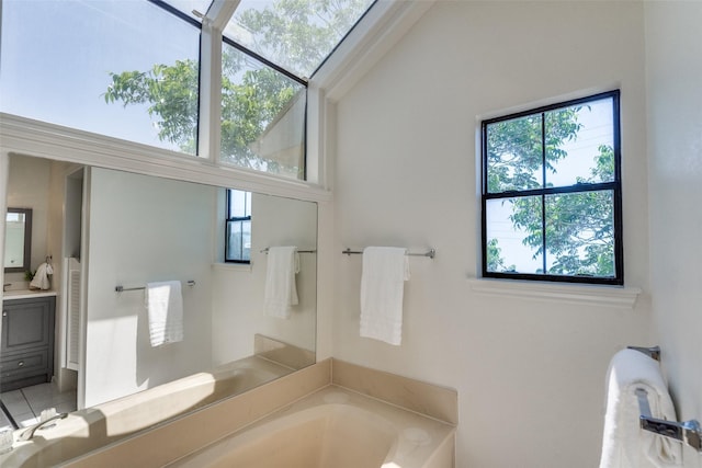 3631 Hilltop Ln, Plano, TX 75023 - bathroom featuring plenty of natural light, a bath, and vanity