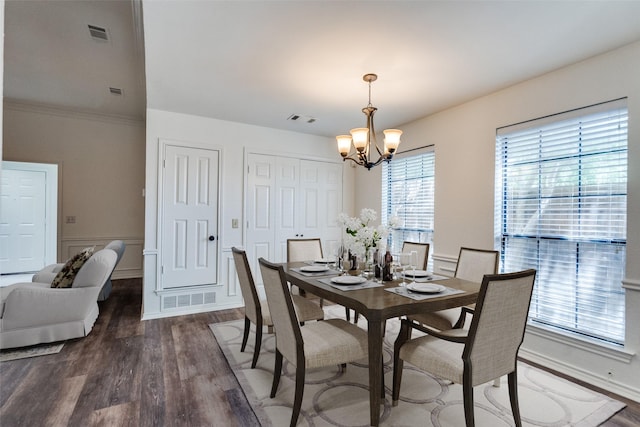 3631 Hilltop Ln, Plano, TX 75023 - dining area featuring a chandelier and wood finished floors