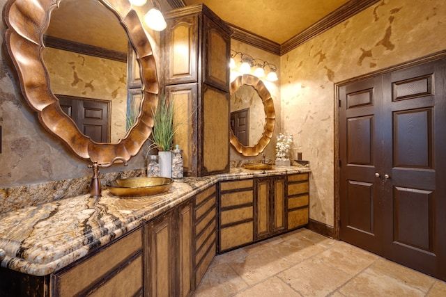 10447 W Dublin Dr, Forney, TX 75126 - full bath featuring crown molding, double vanity, and stone tile floors
