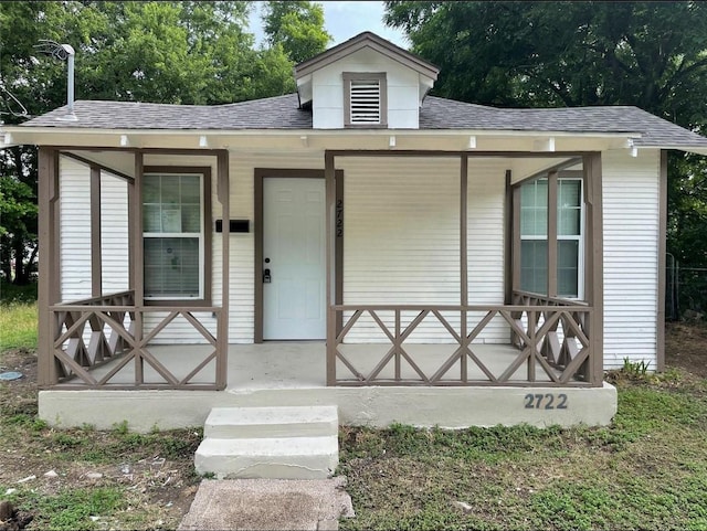 2722 Hector St, Dallas, TX 75210 - view of front of property featuring roof with shingles and covered porch