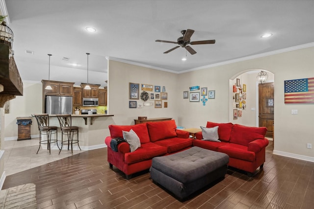 365 Maggie Cir, Flint, TX 75762 - living area featuring ceiling fan, recessed lighting, wood tiled floors, baseboards, and arched walkways