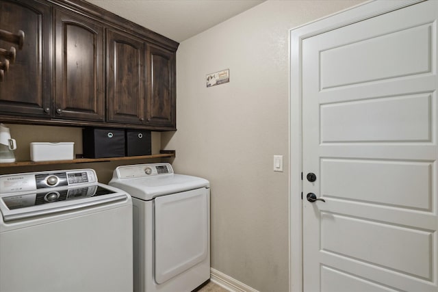 365 Maggie Cir, Flint, TX 75762 - laundry room featuring washer and clothes dryer, cabinet space, and baseboards