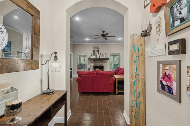 365 Maggie Cir, Flint, TX 75762 - hallway featuring arched walkways, baseboards, wood finish floors, crown molding, and recessed lighting
