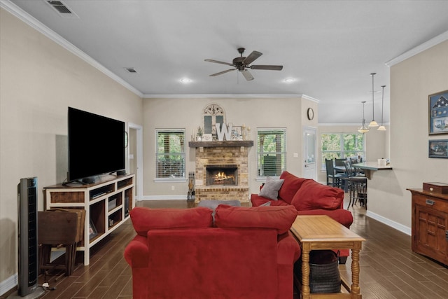 365 Maggie Cir, Flint, TX 75762 - living room with baseboards, a ceiling fan, dark wood finished floors, ornamental molding, and a fireplace
