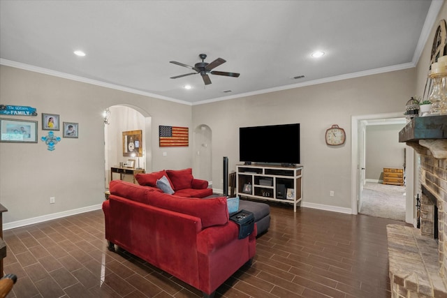 365 Maggie Cir, Flint, TX 75762 - living room featuring arched walkways, ceiling fan, a fireplace, recessed lighting, and baseboards