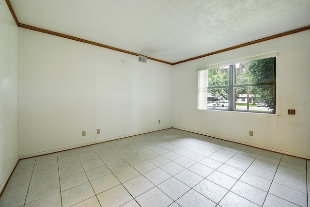 2947 Sinbad Cir, Farmers Branch, TX 75234 - empty room featuring ornamental molding, baseboards, a textured ceiling, and light tile patterned floors