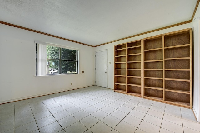2947 Sinbad Cir, Farmers Branch, TX 75234 - spare room featuring crown molding, light tile patterned floors, built in features, baseboards, and a textured ceiling