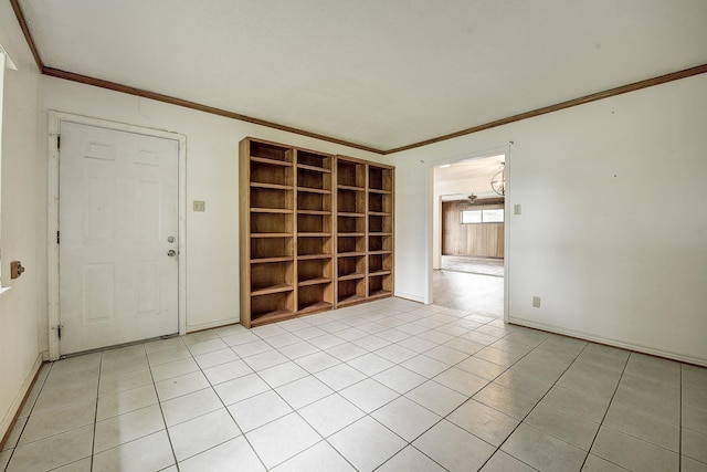 2947 Sinbad Cir, Farmers Branch, TX 75234 - unfurnished room featuring crown molding, light tile patterned floors, and baseboards