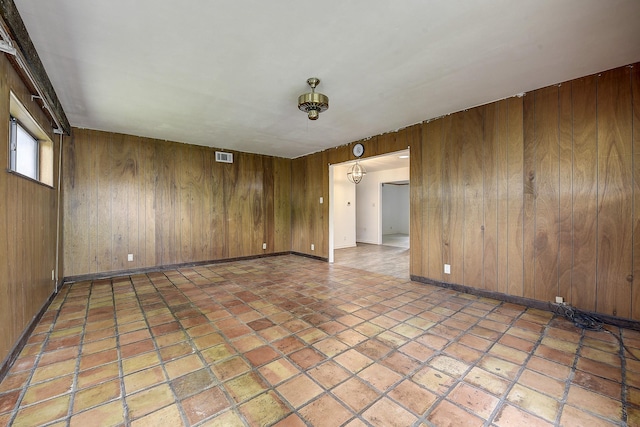 2947 Sinbad Cir, Farmers Branch, TX 75234 - empty room featuring wooden walls and baseboards