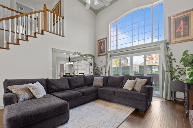 301 Northcreek Dr, Chandler, TX 75758 - living room with a high ceiling, hardwood / wood-style flooring, ceiling fan, and stairs