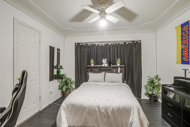 217 NE Rosamond St, Burleson, TX 76028 - bedroom with crown molding, a textured ceiling, dark wood-style flooring, and ceiling fan