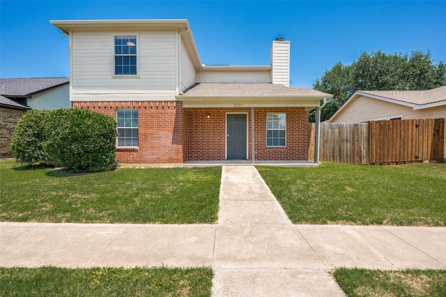 2521 Markland St, Irving, TX 75060 - traditional-style home with brick siding and a chimney