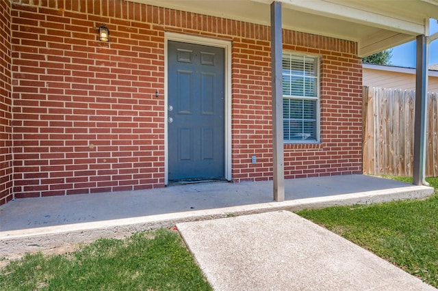 2521 Markland St, Irving, TX 75060 - doorway to property featuring brick siding