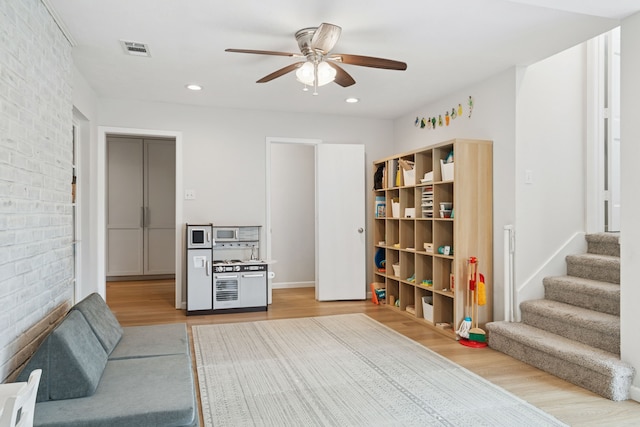 328 High Brook Dr, Richardson, TX 75080 - living area with light wood finished floors, a ceiling fan, stairs, and recessed lighting