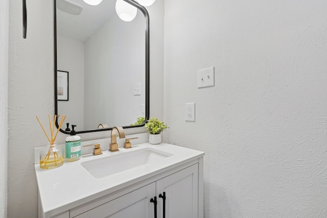328 High Brook Dr, Richardson, TX 75080 - bathroom featuring vanity and a textured wall