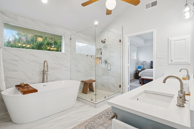 328 High Brook Dr, Richardson, TX 75080 - bathroom featuring double vanity, a soaking tub, a marble finish shower, marble finish floors, and ceiling fan