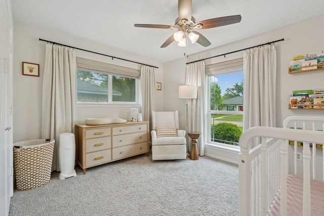 328 High Brook Dr, Richardson, TX 75080 - carpeted bedroom featuring a crib and a ceiling fan