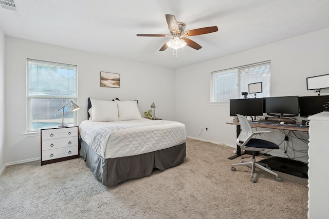 328 High Brook Dr, Richardson, TX 75080 - carpeted bedroom featuring multiple windows, a desk, baseboards, and a ceiling fan