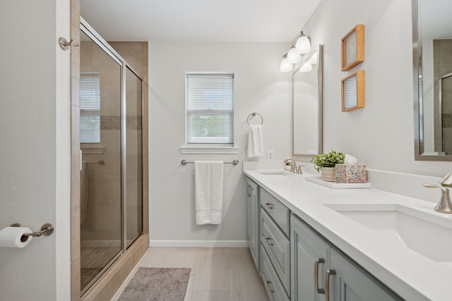 328 High Brook Dr, Richardson, TX 75080 - full bath with double vanity, a shower stall, and baseboards