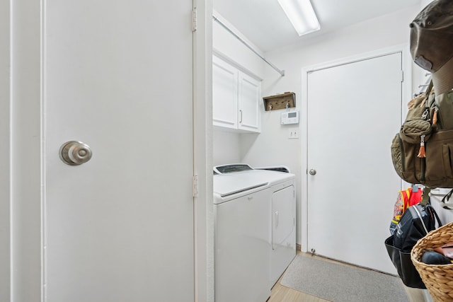328 High Brook Dr, Richardson, TX 75080 - laundry room with cabinet space, separate washer and dryer, and light wood finished floors