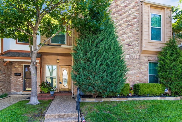 7014 Regalview Cir, Dallas, TX 75248 - view of exterior entry featuring brick siding
