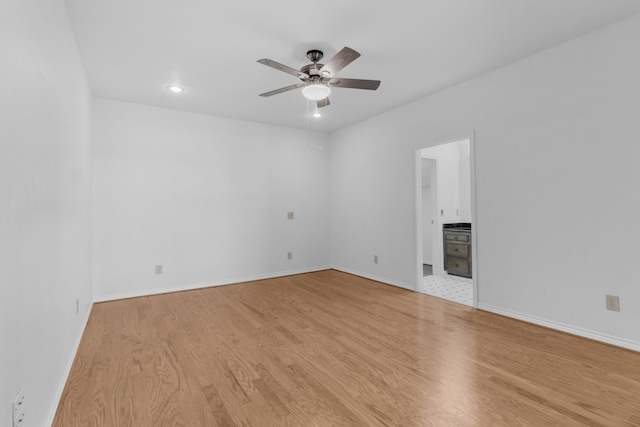 7014 Regalview Cir, Dallas, TX 75248 - unfurnished room featuring light wood-style floors, ceiling fan, baseboards, and recessed lighting