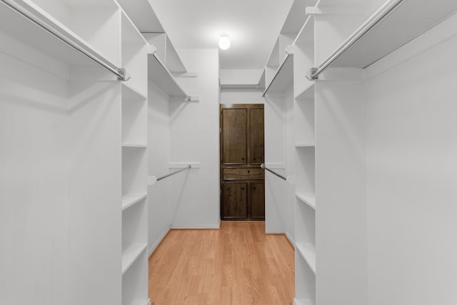 7014 Regalview Cir, Dallas, TX 75248 - spacious closet with light wood-type flooring