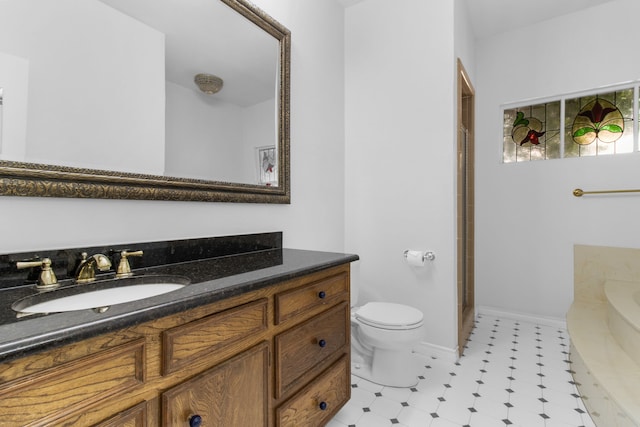 7014 Regalview Cir, Dallas, TX 75248 - full bath featuring vanity, toilet, a garden tub, tile patterned floors, and an enclosed shower