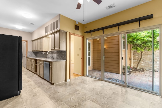 7014 Regalview Cir, Dallas, TX 75248 - kitchen with freestanding refrigerator, stainless steel dishwasher, a ceiling fan, backsplash, and a sink