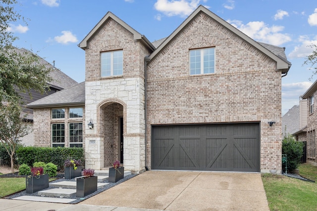 5024 Amande Ave, Lewisville, TX 75056 - french country inspired facade featuring brick siding, an attached garage, driveway, and a shingled roof
